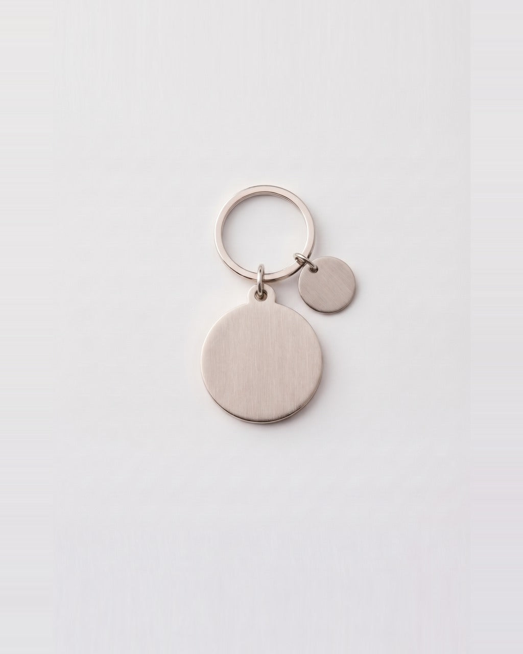 Compass Keychain in White — back